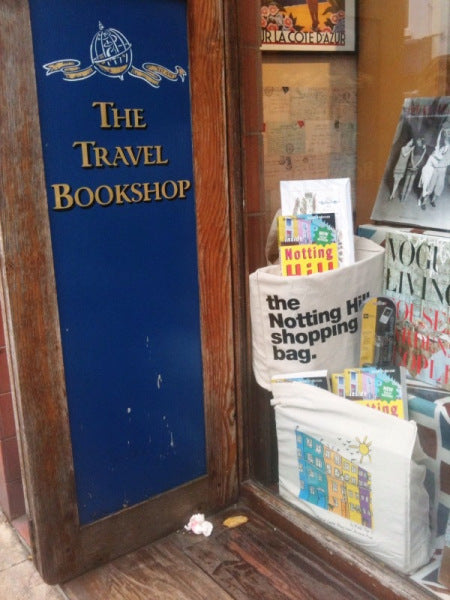 Notting Hill Shopping Bag displayed in @travelbookshop window